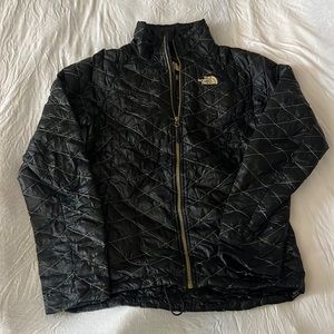 North face thermoball jacket in black and gold size small